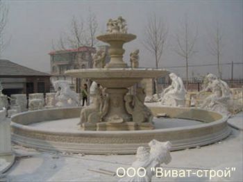 Фонтан с детьми на вершине